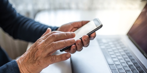 Elder person on phone