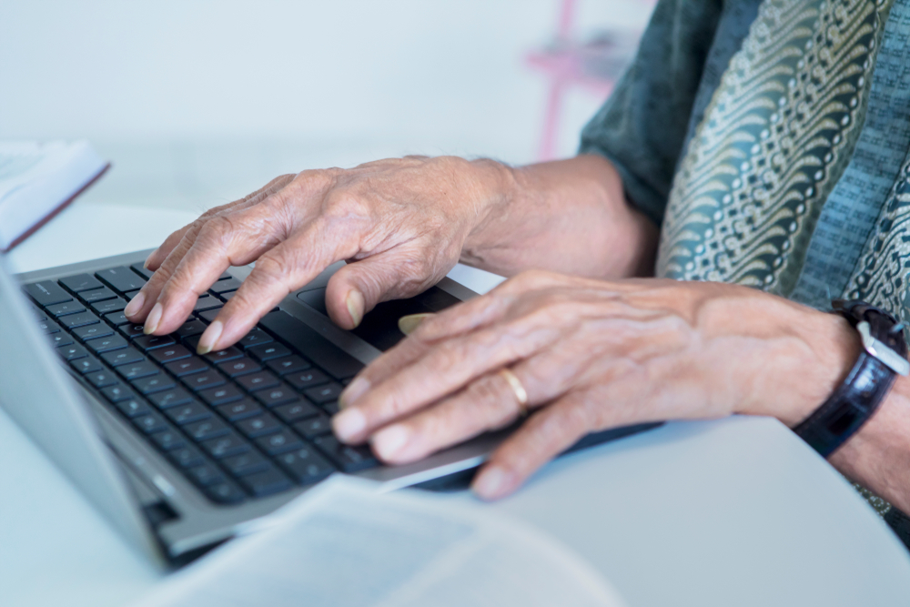 Elder person on computer